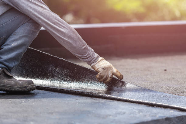 Professional Exterior Waterproofing technician working in Westwood, KY